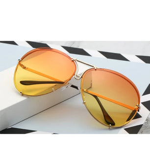 Women's Alloy Frame Acrylic Lens Oval Shaped Trendy Sunglasses