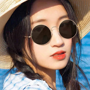 Women's Alloy Frame Polaroid Lens Round Shaped UV400 Sunglasses