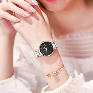 Women's Alloy Case Folding Clasp Round Shaped Quartz Watch