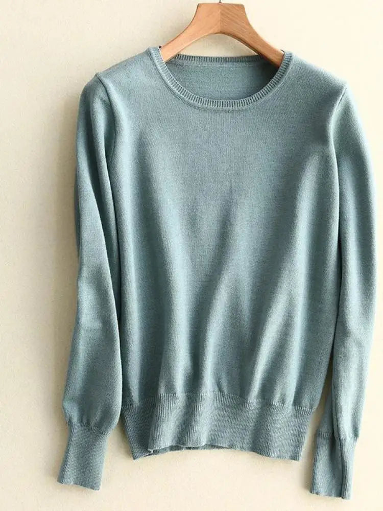 Women's Polyester O-Neck Full Sleeves Solid Pattern Sweater