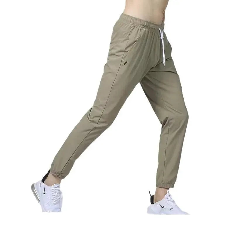 Men's Nylon Mid Elastic Waist Closure Solid Pattern Casual Trousers