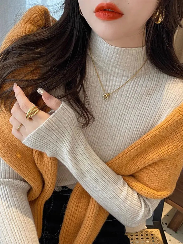 Women's Polyester Turtleneck Full Sleeves Solid Pattern Sweater