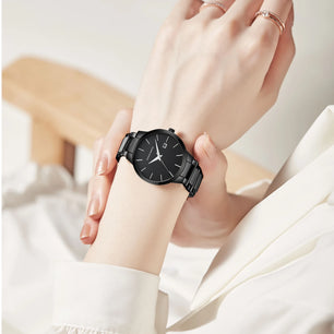 Women's Alloy Case Folding Clasp Round Shaped Quartz Watch