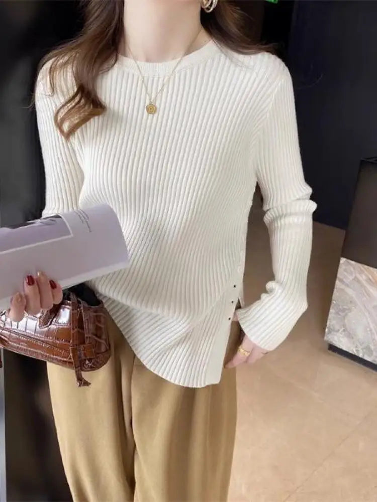 Women's Polyester O-Neck Full Sleeves Solid Pattern Sweater