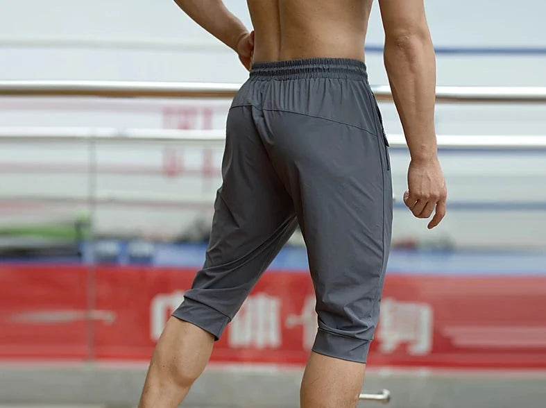 Men's Polyester Drawstring Closure Solid Pattern Sports Pant